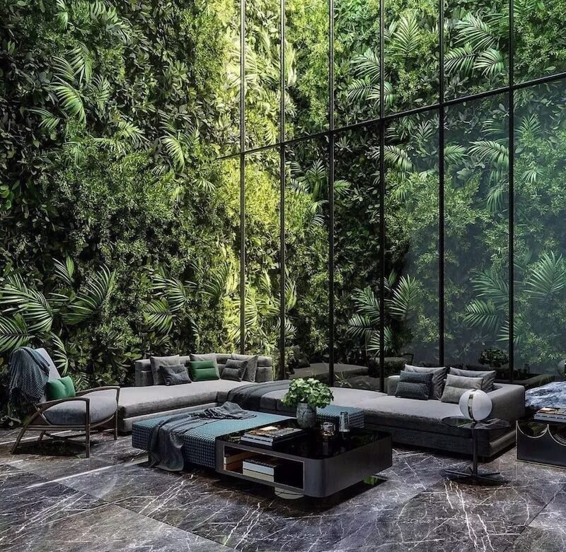 Không gian sinh hoạt Biophilic nổi bật với mảng tường xanh thẳng đứng, nội thất tối giản và ánh sáng tự nhiên, mang cảm giác sống giữa thiên nhiên trong lành
