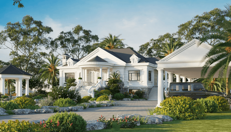 Khu sân vườn phía trước được tổ chức tinh tế với lối đi lát đá, tiểu cảnh khô và chòi nghỉ mái Thái nhỏ