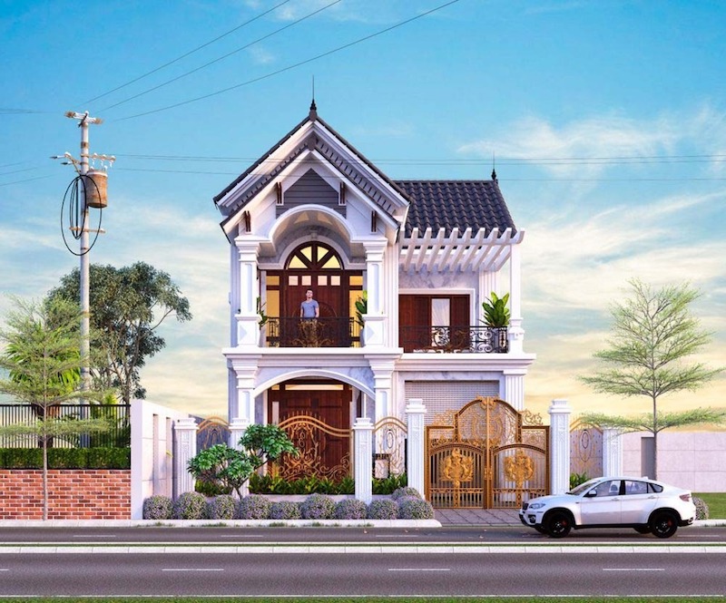 Mặt tiền biệt thự mái Thái cân xứng với cột tròn, vòm cong mềm mại, ban công sắt mỹ thuật và gam trắng sang trọng.
