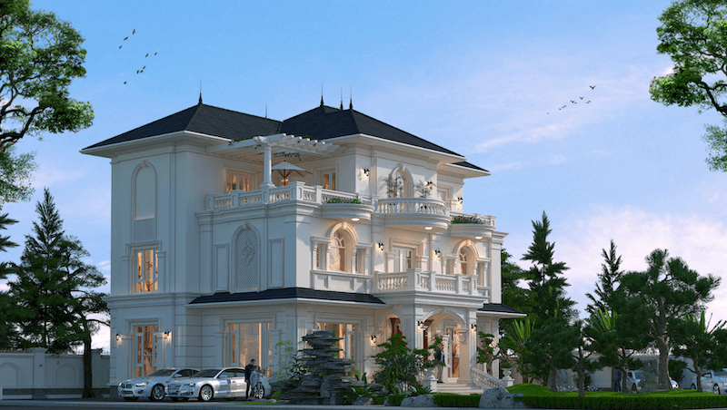 Biệt thự tân cổ điển quy mô lớn, nhấn mạnh cột trụ, ban công cong và mái dốc bề thế, tạo tổng thể sang trọng, chuẩn mực châu Âu giữa không gian sân vườn rộng