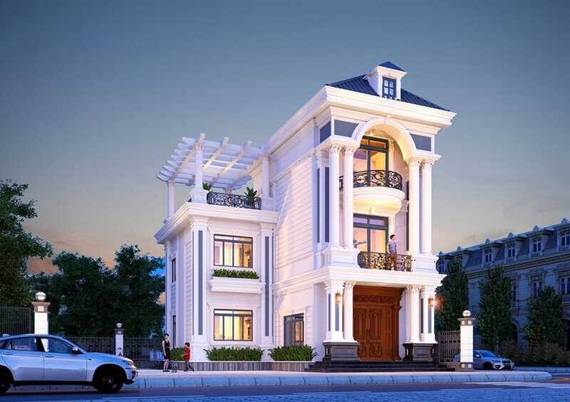 Chiếu sáng hắt cột và mái sảnh làm nổi rõ chiều sâu khối nhà, giúp biệt thự tân cổ điển trở nên sang trọng, nổi bật trên trục đường mà không cần quá nhiều chi tiết trang trí