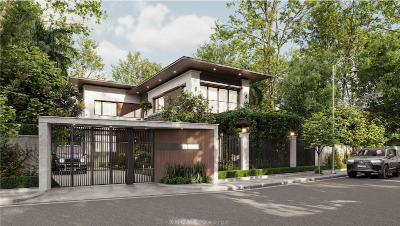 Hệ cổng và hàng rào thiết kế đồng bộ với mặt tiền, kết hợp mảng gỗ ốp và lam kim loại mang lại cảm giác sang trọng, riêng tư cho không gian sống