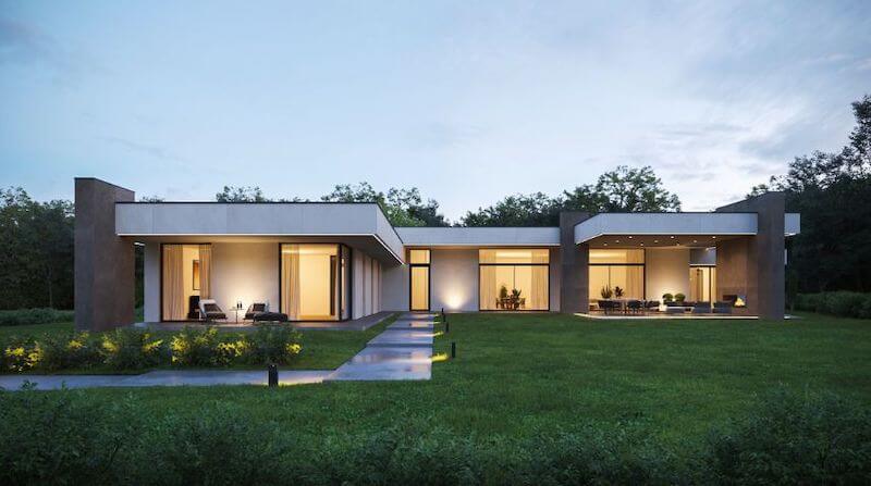 Biệt thự mái bằng được thiết kế theo phong cách không gian mở với các khối kiến trúc trải dài và hệ cửa kính lớn, giúp kết nối trực tiếp giữa nội thất và sân vườn bên ngoài