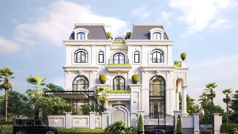 Hệ cửa vòm cao kết hợp ban công sắt mỹ thuật và mảng tường phào chỉ tinh gọn tạo nên mặt tiền cân đối, sang trọng và đầy chiều sâu