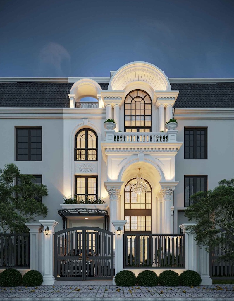 Vòm sảnh bán nguyệt cao rộng, hệ cột Corinth chạm khắc tinh xảo và đèn chùm pha lê thả rơi lộng lẫy, tạo nên diện mạo quyền quý ngay mặt tiền đô thị