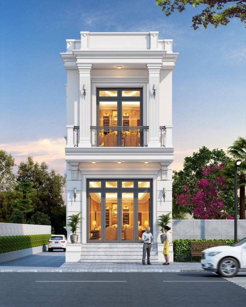 Mặt tiền nhà phố Tân cổ điển gây ấn tượng với cặp cột Ionic chạy suốt hai tầng, kết hợp hệ cửa kính cao rộng đón sáng, tạo cảm giác thanh thoát nhưng vẫn chuẩn mực và sang trọng