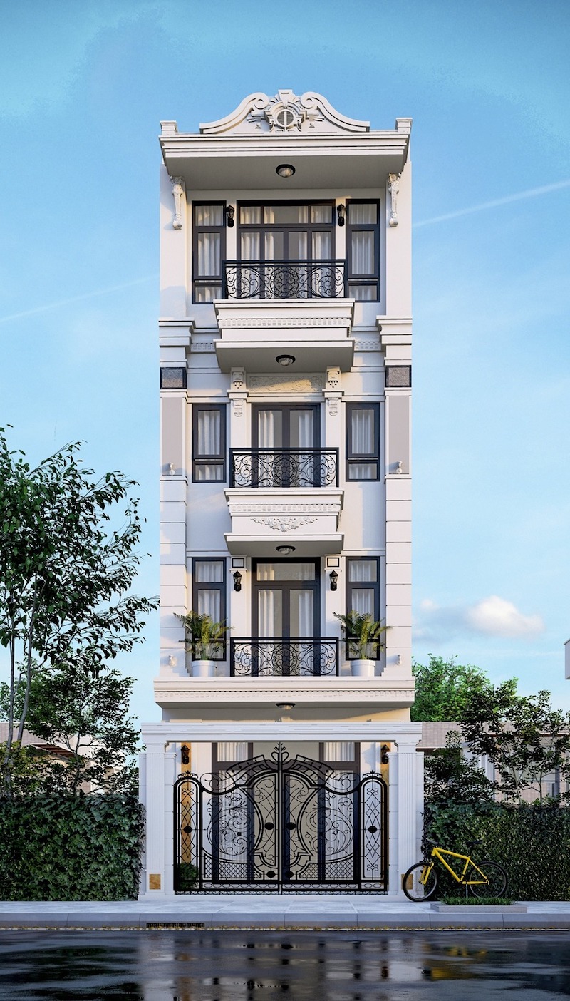 Hệ lan can sắt mỹ thuật uốn họa tiết đối xứng tinh xảo, tạo điểm nhấn mềm mại giữa mặt tiền trắng thanh lịch và tôn lên vẻ sang trọng chuẩn mực