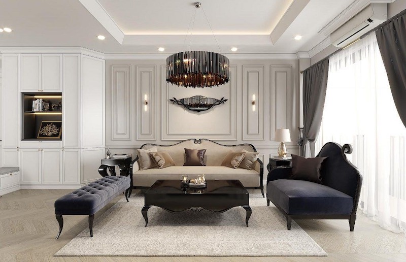 Sự tương phản tinh tế giữa gam kem trang nhã và nội thất tối màu giúp tổng thể vừa quý phái, vừa hiện đại - rất phù hợp với không gian chung cư cao cấp