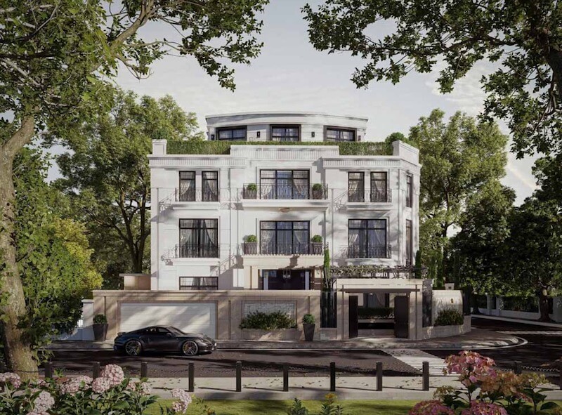 Hệ cây lớn bao quanh đóng vai trò như một lớp đệm xanh tự nhiên, giúp công trình tách khỏi nhịp sống đường phố, đồng thời tạo bóng mát và chiều sâu thị giác cho mặt tiền