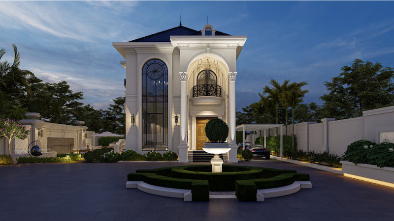 Bố cục đăng đối kết hợp cửa vòm cao, hệ cột thức gọn gàng, chiếu sáng vàng ấm giúp tổng thể vừa bề thế vừa sang trọng về đêm