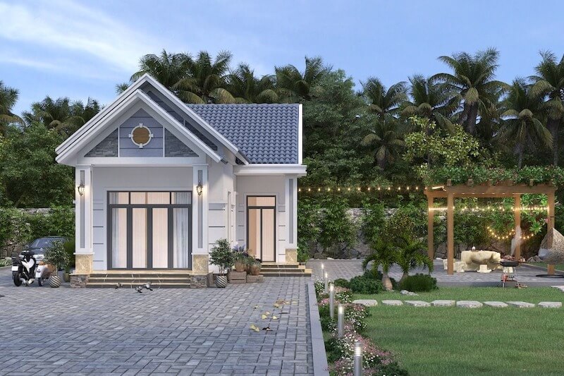 Phối cảnh nhà vườn tân cổ điển xanh ghi trong khuôn viên rộng rãi, có sân cỏ, khu vực BBQ ngoài trời và hệ đèn trang trí sân vườn lung linh về đêm