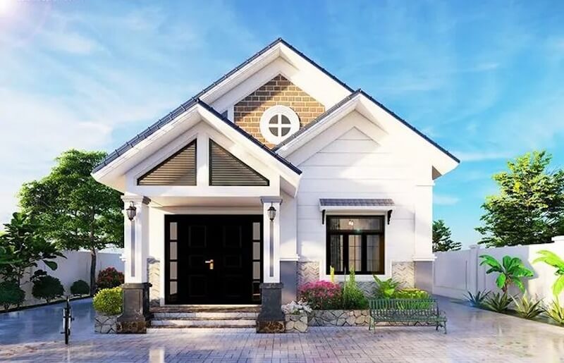 Phong cách mẫu nhà vườn tông trắng hiện đại với thiết kế mái giật cấp, ô thoáng gió tròn trang trí và hệ cột trụ vuông ốp đá tối màu ở chân cột độc đáo