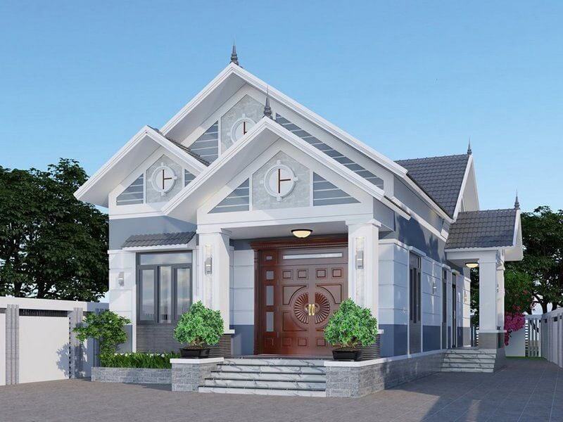 Mẫu nhà mái Thái hiện đại tông màu xanh ghi, thiết kế mặt tiền đối xứng với hệ cửa gỗ lớn và bậc tam cấp ốp đá, diện tích rộng rãi thích hợp gia đình đông người