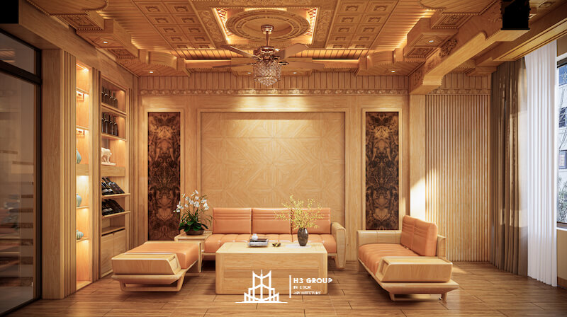 Trần giật cấp chạm khắc tinh xảo kết hợp đèn chùm pha lê trở thành điểm nhấn trung tâm, trong khi bộ sofa gỗ bọc da màu kem giúp cân bằng sự sang trọng