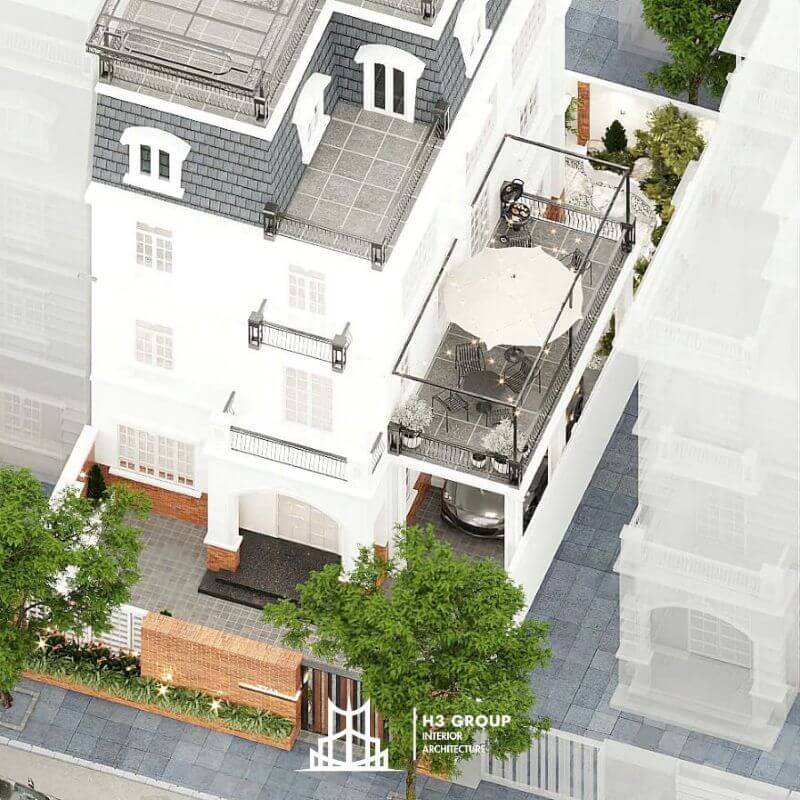 Biệt thự với mái dốc đặc trưng, ban công sắt thanh mảnh và sân thượng bố trí khu thư giãn ngoài trời, tạo không gian sống sang trọng, thoáng đãng