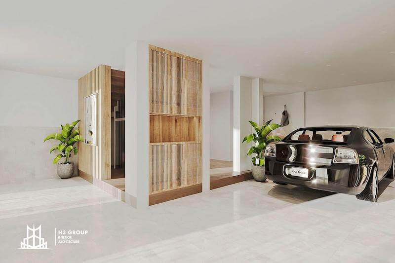 Khu vực gara thiết kế tối giản với tông trắng chủ đạo, kết hợp vách gỗ nan tự nhiên tạo điểm nhấn ấm áp, mang đúng tinh thần thanh lịch và tinh gọn của phong cách Bắc Âu