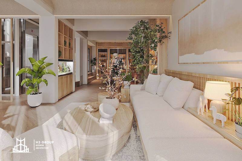 Không gian phòng khách nổi bật với tông trắng - gỗ sáng chủ đạo, nội thất tối giản và cây xanh trang trí, mang lại cảm giác ấm áp, nhẹ nhàng