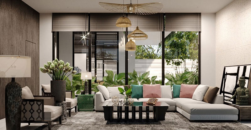 Phòng khách nổi bật với hệ cửa kính lớn mở ra mảng xanh sân vườn, kết hợp nội thất trung tính tạo không gian sống thư thái, chan hòa thiên nhiên