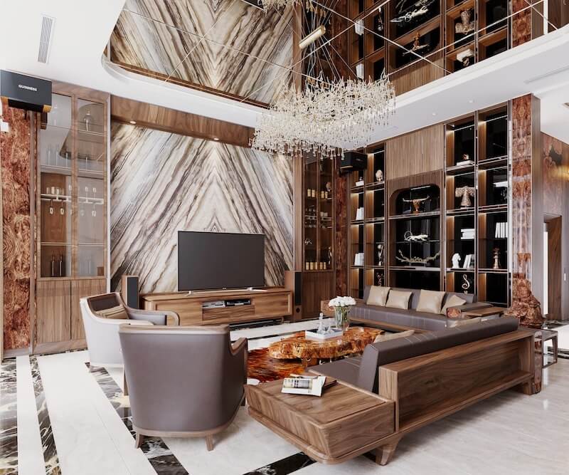 Không gian phòng khách mang phong cách hiện đại sang trọng, nổi bật với hệ vách đá đối xứng vân ấn tượng và toàn bộ nội thất gỗ óc chó từ sofa, kệ tivi đến tủ trưng bày
