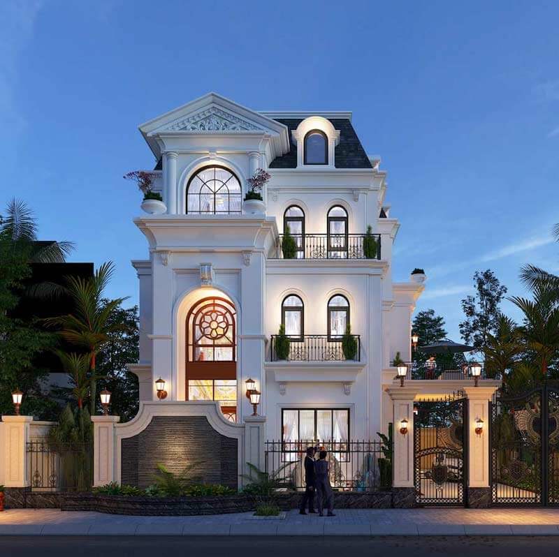 Mặt tiền được bố cục cân đối với hệ cột trang trí, mái Mansard và ánh sáng ngoại thất ấm áp, tôn lên đẳng cấp kiến trúc biệt thự