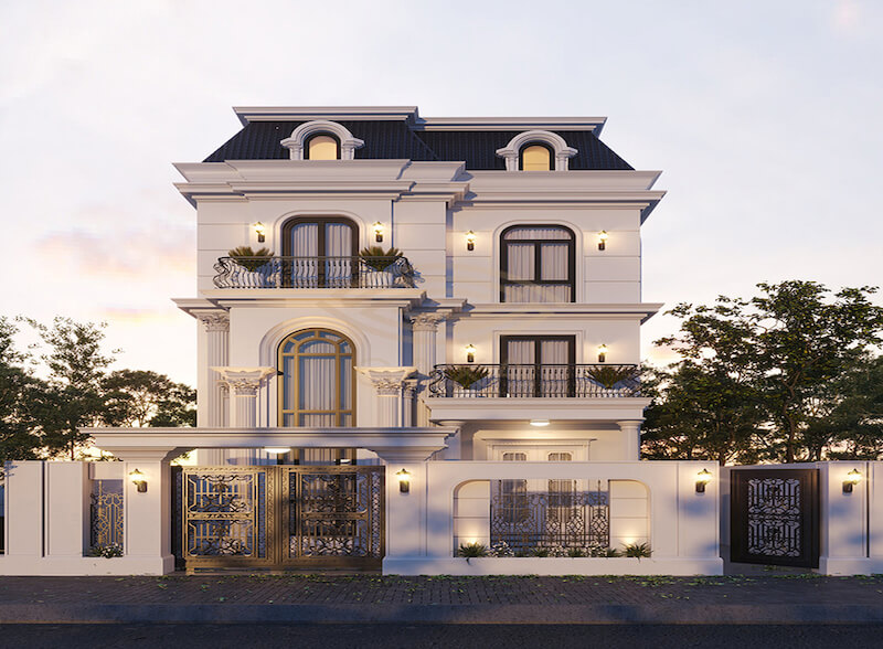 Mặt tiền thiết kế đối xứng cùng phào chỉ thanh lịch, kết hợp cổng sắt mỹ thuật và ánh sáng ngoại thất, tôn lên vẻ đẹp đẳng cấp và bề thế