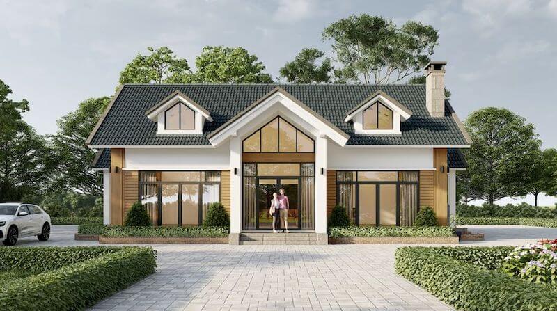 Không gian phía trước được quy hoạch gọn gàng với lối đi rộng và thảm cây xanh thấp, giúp tổng thể ngôi nhà trở nên thanh lịch và thoáng đãng