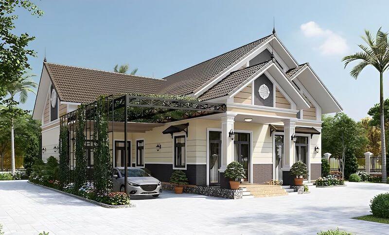 Bên hông bố trí giàn pergola kết hợp dây leo làm khu đỗ xe thoáng mát, đồng thời tăng thêm mảng xanh cho không gian sống