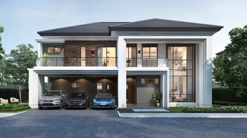 Khu vực ban công rộng cùng gara để xe tiện lợi được thiết kế liền mạch với tổng thể, trong khi các vật liệu như đá ốp, kính và gam màu trung tính góp phần tạo nên vẻ sang trọng