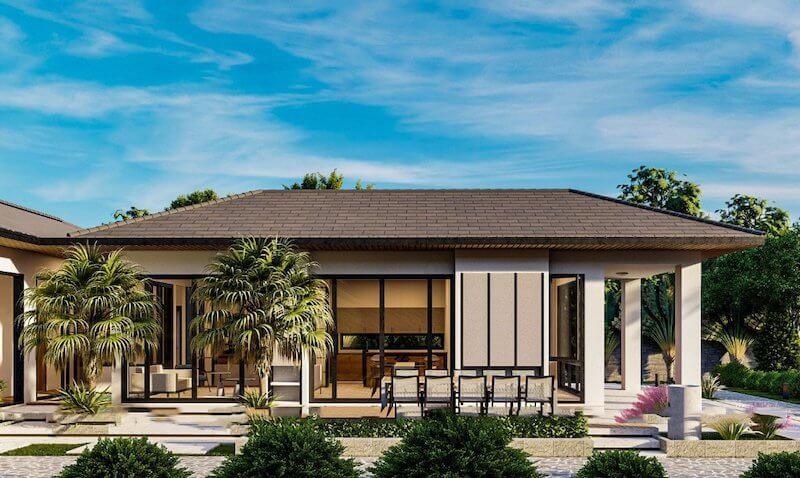 Hệ cửa kính lớn giúp ánh sáng tự nhiên tràn ngập bên trong, đồng thời mang lại tầm nhìn thoáng đãng ra sân vườn xanh mát