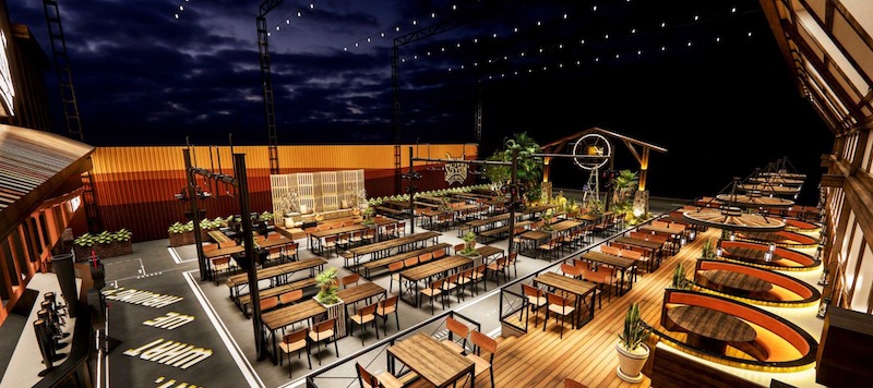 Bố cục phong cách công nghiệp nổi bật với khung thép lộ kết cấu, bàn ghế gỗ mộc xếp thẳng hàng và hệ đèn treo tạo cảm giác mạnh mẽ, phóng khoáng