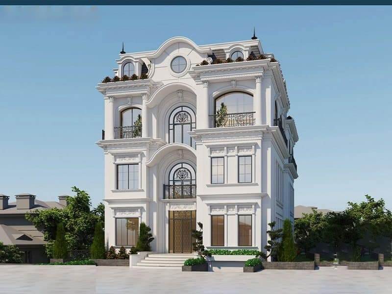 Biệt thự tân cổ điển ba tầng nổi bật với mặt tiền đối xứng, mái Mansard duyên dáng, cửa vòm cao thoáng và hệ cột trang trí thanh lịch, tôn vẻ sang trọng