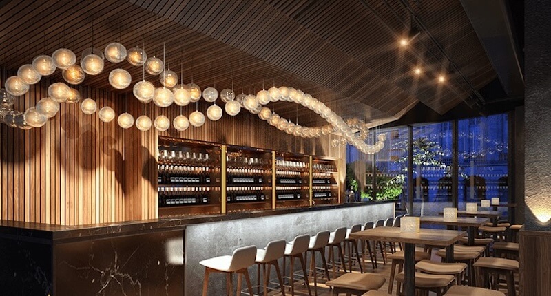 Thiết kế quầy bar ưu tiên các mảng khối lớn, bề mặt liền mạch nhằm mang lại cảm giác sang trọng và thời thượng