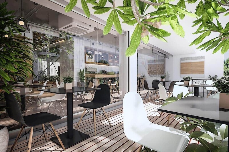 Bàn bar dài sát tường kết hợp dãy bàn 2 người, tối ưu lối đi thông thoáng và linh hoạt cho mọi đối tượng khách