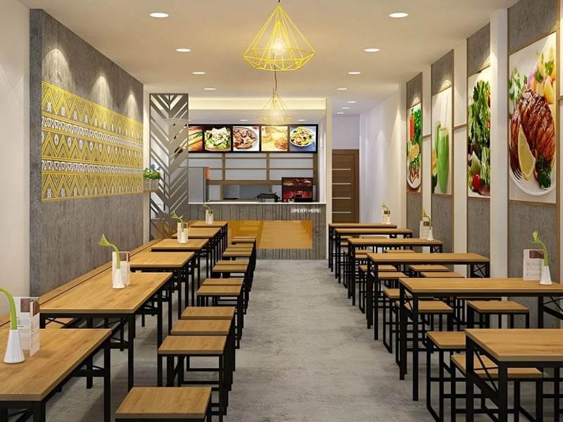 Tường ốp gạch men trắng vừa giúp bảo vệ bề mặt khỏi vết ố dầu mỡ vừa mở rộng thị giác và mang lại cảm giác sạch sẽ, an tâm cho thực khách